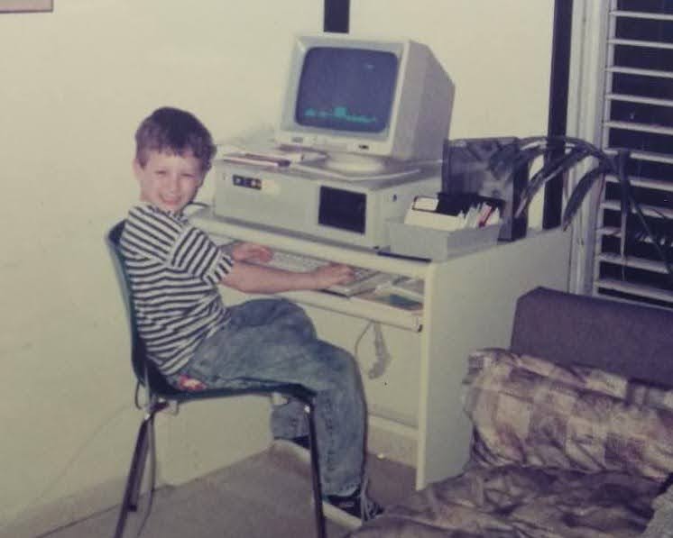 Young Nadav at an XT computer