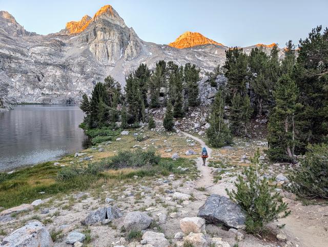 To get to the meeting point we started walking around 6am. The sun rising at Rae Lakes.
