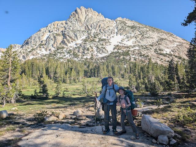 The striking formation of Ragged Peak comes into view